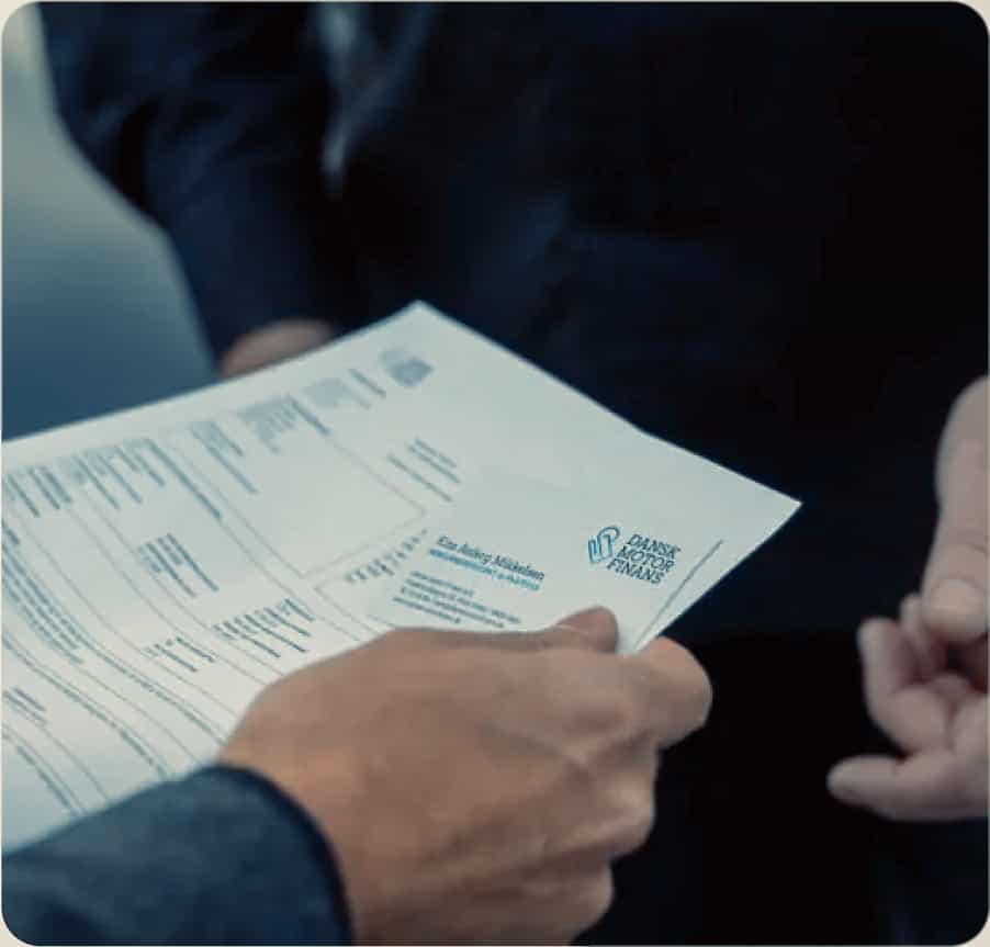 a person holding a piece of paper